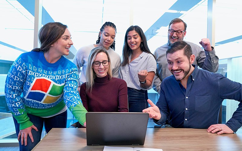 People in front of a computer