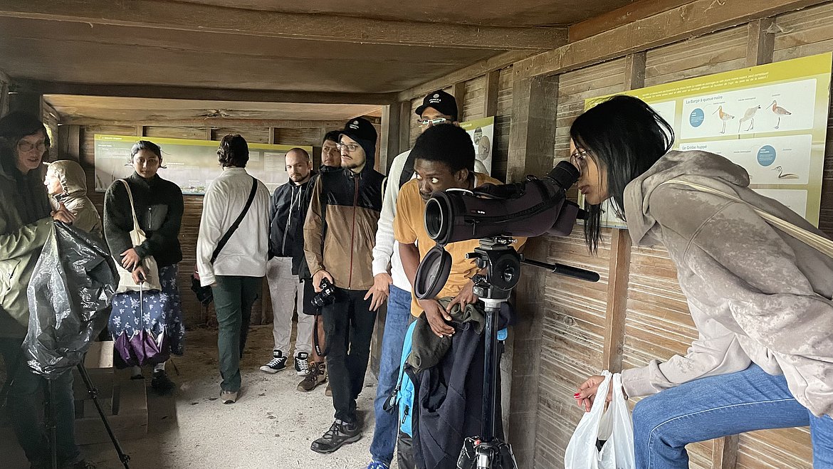 Students doing birdwatching